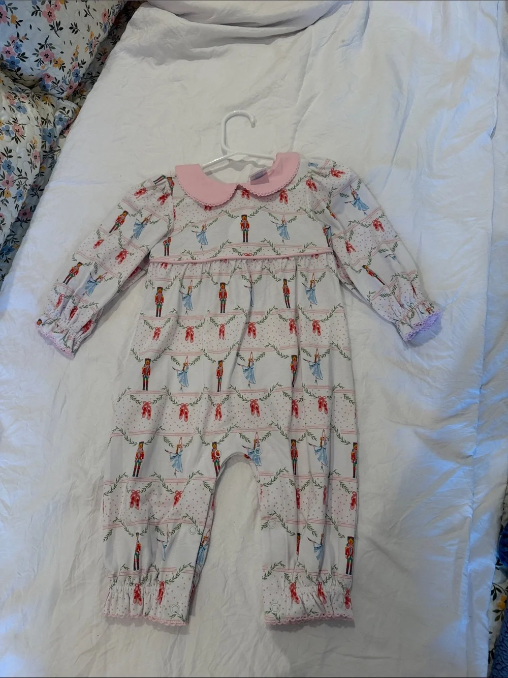 Pink-Collared Nutcracker Print Baby One-Piece